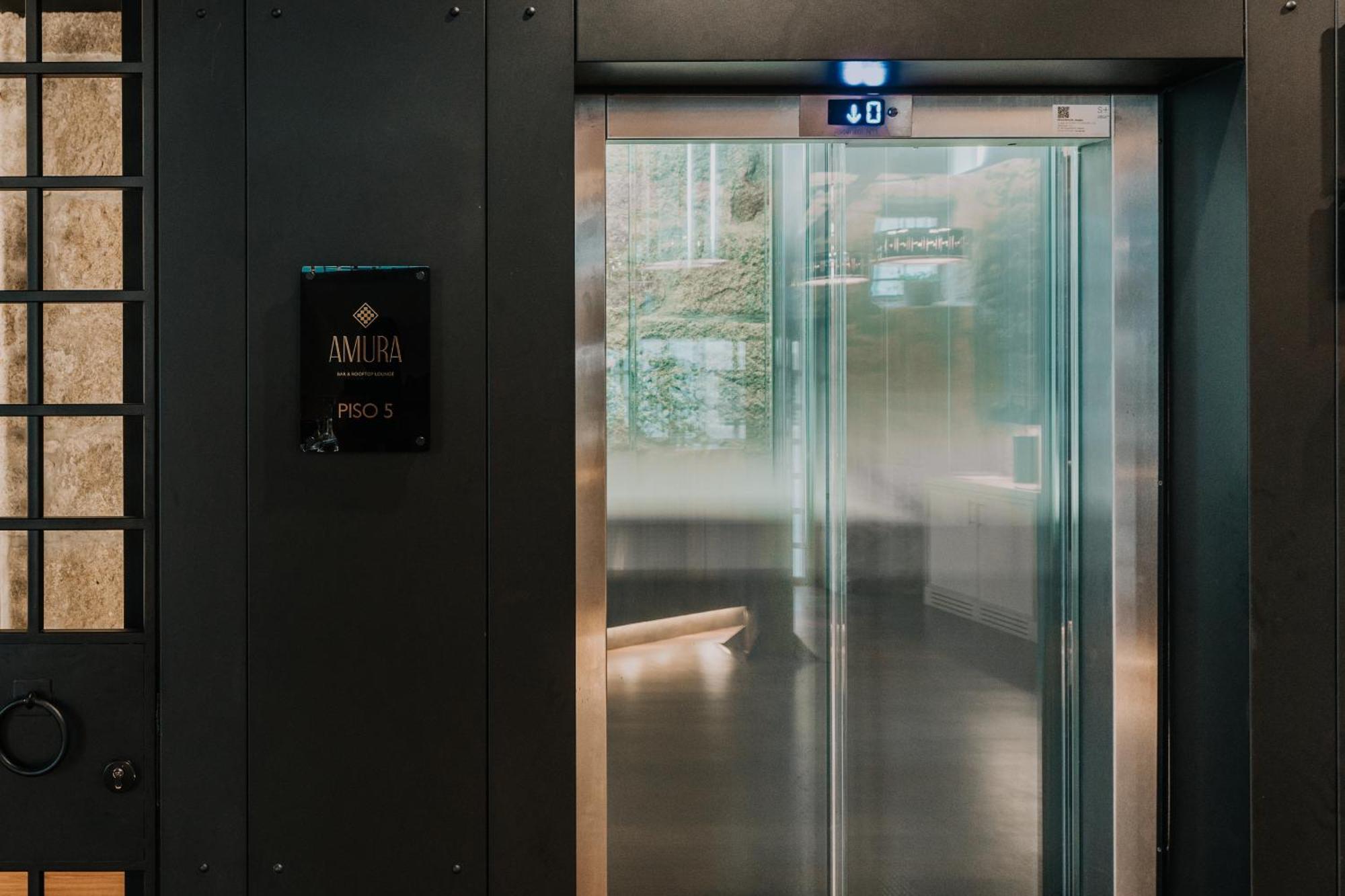 Hotel Timbre Virtudes Porto Exterior foto A glass elevator
